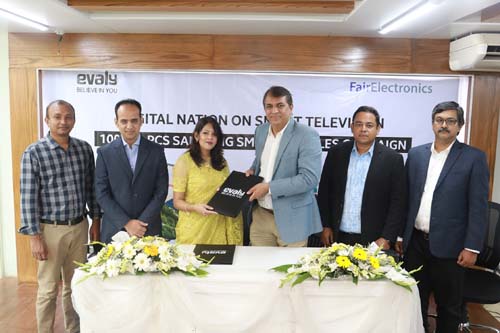 Shamima Nasrin, Chairman of Evaly and Mesbah Uddin, chief marketing officer (CMO) of Fair Electronics, exchanging an agreement signing document at Evaly office in the city on Tuesday to work together with the goal of delivering Samsung smart TVs to one la