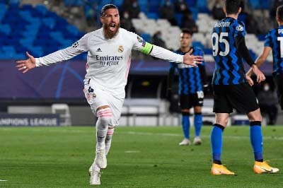 Real Madrid's Spanish defender Sergio Ramos celebrates his goal during the UEFA Champions League group B football match against Inter Milan at the Alfredo di Stefano stadium in Valdebebas, on the outskirts of Madrid on Tuesday.