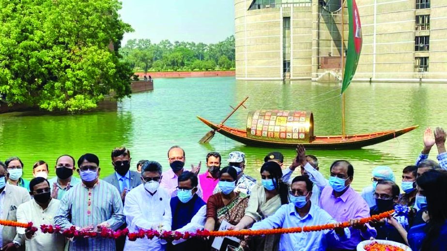 Chief Whip of the Jatiya Sangsad (JS) Noor-e-Alam Chowdhury along with others at the inaugural ceremony to float boats in the lake of JS organised on the occasion of Mujib Year by the Bangladesh Parjoton Corporation on Thursday. State Minister for Civil A