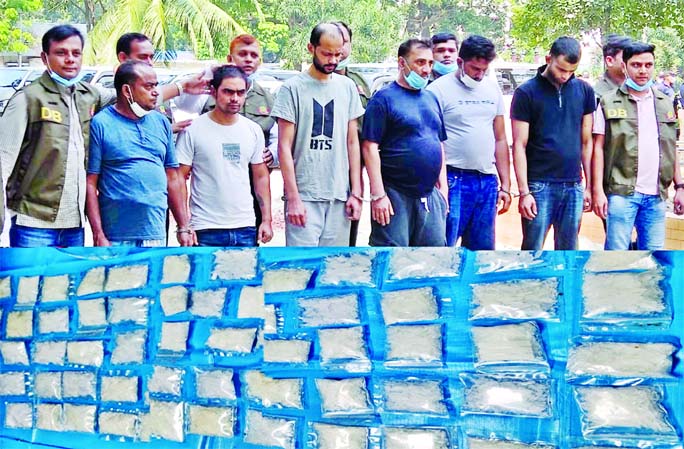 DB Police arrest 6 persons along with expensive stimulant drug 'Ice' worth approximately Tk 60 lakh imported from Malaysia. This photo was taken from DMP Media Centre on Thursday.