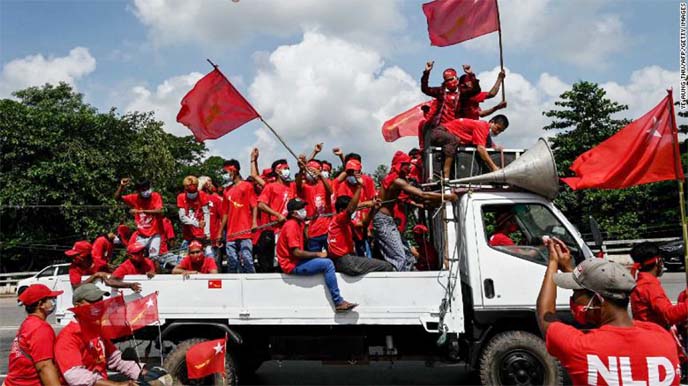 Supporters of the National League for Democracy (NLD) party take part in an election campaign rally on the outskirts of Yangon.