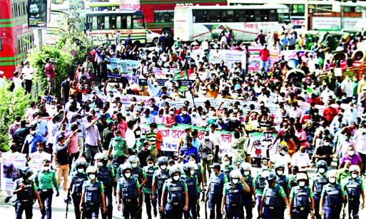 Members of the Bangladesh Hindu Buddhist Christian Unity Council gather in the capital's Shahbagh intersection on Saturday condemning attacks on the minority community.