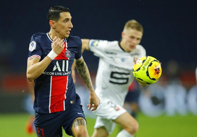 Angel Di Maria of Paris Saint-Germain (left) runs with the ball during the French Ligue 1 soccer match between Paris Saint-Germain and Rennes at the Parc des Princes in Paris, France on Saturday.