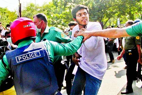 Police disperse the students of medical and dental colleges who took to the streets of the city's Shahbagh intersection as part of their demand for a session-free medical academic year on Sunday.