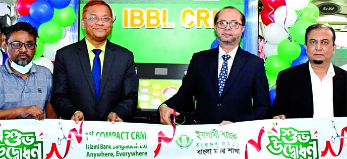 Mohammed Monirul Moula, Additional Managing Director of Islami Bank Bangladesh Limited, inaugurating its 1st Compact Cash Recycling Machine (CRM) at Eastern Plaza in Dhaka recently. Mizanur Rahman, SEVP of the bank and local elites were also present.