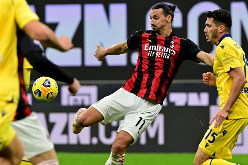 AC Milan forward Zlatan Ibrahimovic from Sweden kicks the ball during the Italian Serie A football match against Hellas Verona at the San Siro stadium in Milan on Sunday.