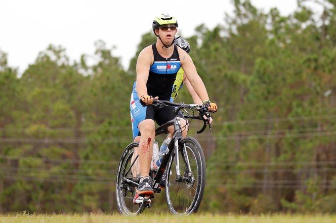 This screenshot taken on Tuesday from the official Ironman Twitter account shows Chris Nikic competing in the bike course of Ironman Florida.