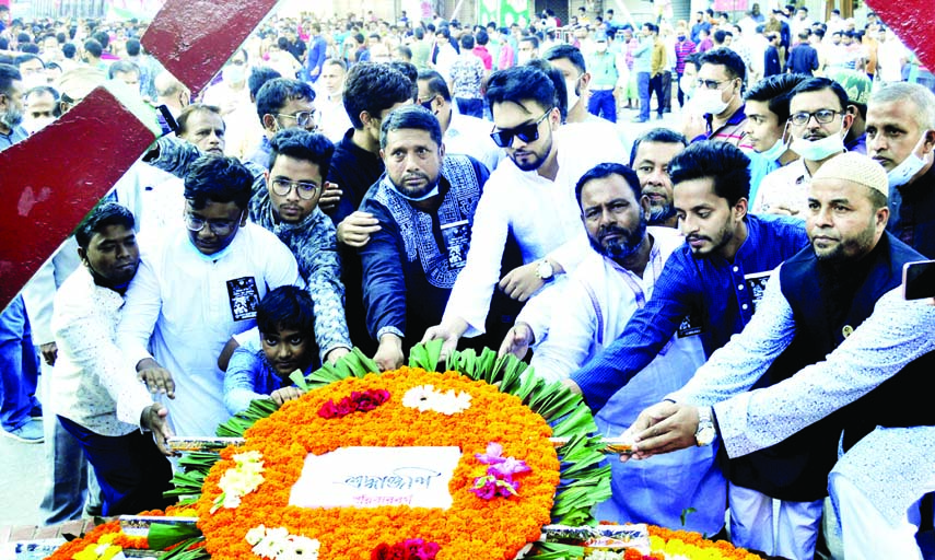 Different organisations including family member pay floral tributes to Noor Hossain at Noor Hossain Chattar in the city on Tuesday marking Shaheed Noor Hossain Day.