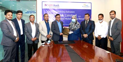 Mamoon Mahmood Shah, Managing Director (CC) of NRB Bank Limited and Nasreen Jahan Ratna, MP, Chairman of Kuakata Grand Hotel & Sea Resort, exchanging an agreement signing document at the bank's head office in the city on Wednesday. Under the deal, Debit