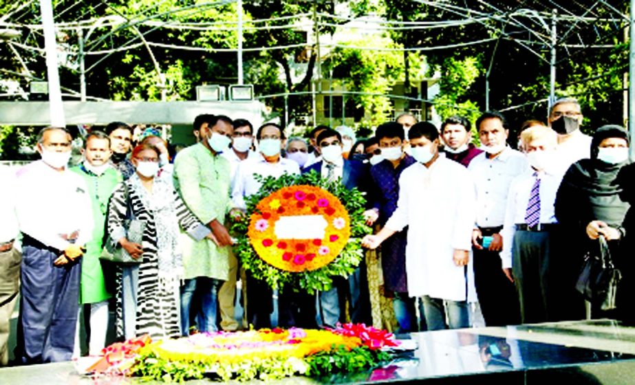 Newly appointed Chairman of Board of Directors of the Investment Corporation of Bangladesh (ICB) Prof. Dr. Kismatul Ahsan pays homage to the portrait of Father of the Nation Bangabandhu Sheikh Mujibur Rahman at 32, Dhanmondi on Wednesday. Abul Hossain, Ma