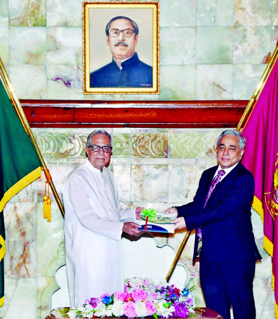 President Md. Abdul Hamid receives 'Annual Report of the Supreme Court-2019' from Chief Justice Syed Mahmud Hossain at Bangabhaban on Wednesday.