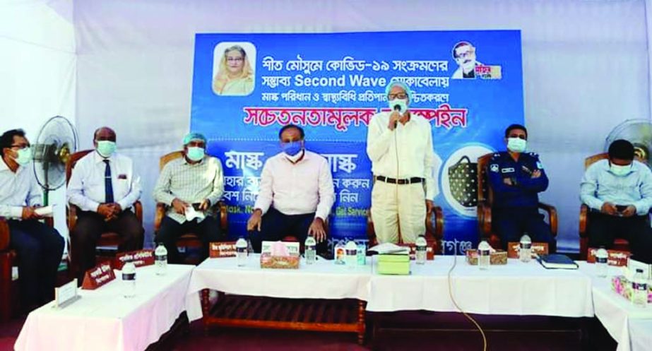 Senior District & Session Judge of Kishoreganj Md. Saidur Rahman speaks at a awareness campaign on following health guidelines to face second wave of Coronavirus at court premises on Tuesday afternoon.