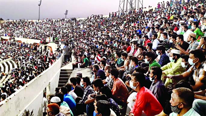 Large crowd throng the Bangabandhu National Stadium in Dhaka to support Bangladesh National Football team in their first FIFA friendly match against Nepal on Friday ignoring fears of second wave coronavirus infection in the country.