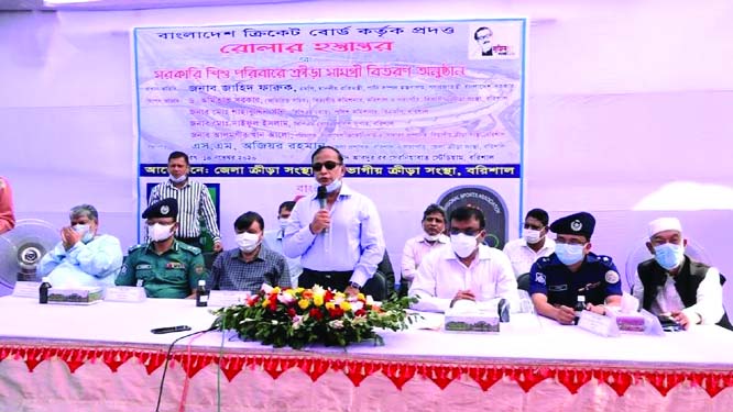 State Minister for Water Resources Colonel (Retd) Zahid Faruk Shamim, MP, speaks at the sports materials distribution ceremony as the chief guest at Shahid Abdur Rob Serniabat Stadium in Barishal on Saturday. Barishal Divisional Commissioner Amitabh Sarka