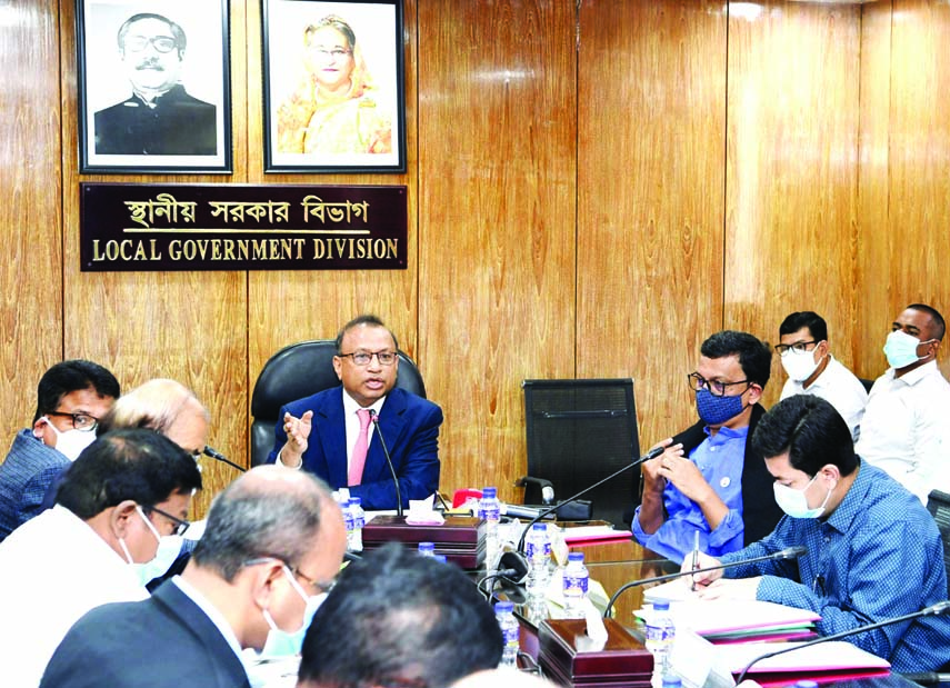 Local Government, Rural Development and Co-operatives Minister Md. Tajul Islam speaks at a discussion meeting at his Secretariat Office in the capital on Sunday. Among others, State Minister for Shipping Khalid Mahmud Chowdhury and Dhaka South City Corpor