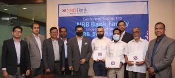 Tateyama Kabir, Vice Chairman of the NRB Bank Limited, handing over cheque of Tk. 17 lakh to the representatives of two critically ill employees and one employee's spouse of the bank under the CSR activities at its head office in the city on Sunday. Mamo