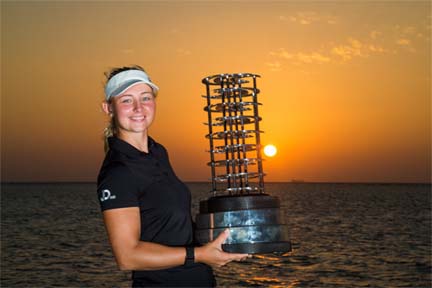 Emily Pedersen celebrates with the trophy after winning the inaugural Saudi Ladies International title on Sunday.