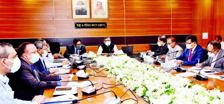 Health and Family Welfare Minister Zahid Maleque presides over the meeting for the development of two projects financed by World Bank and Asian Development Bank at the seminar room of the ministry on Monday.