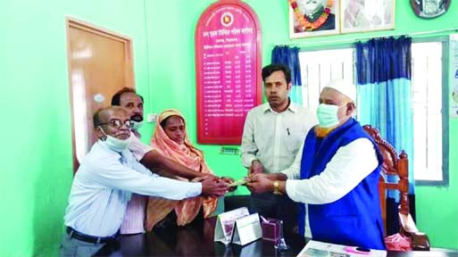 M. A. Based, Sirajganj's Raiganj Upazila Engineer (LGED) distributes cheque of monthly payment among the women employees of Ghurka Union Parishad (UP) at a ceremony on Tuesday. UP Chairman and Secretary Zillur Rahman Sarkar and Mizanur Rahman were presen