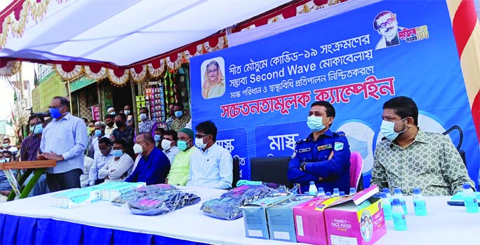 Kishoreganj DC Sarowar Morshed Chowdhury presides over a discussion meeting on second wave of Coronavirus infection in the country at Bara Bazar in the district town on Tuesday noon. Civil Surgeon (CS) Dr. Mujibur Rahman and SP Mashrukur Rahman Khaled wer