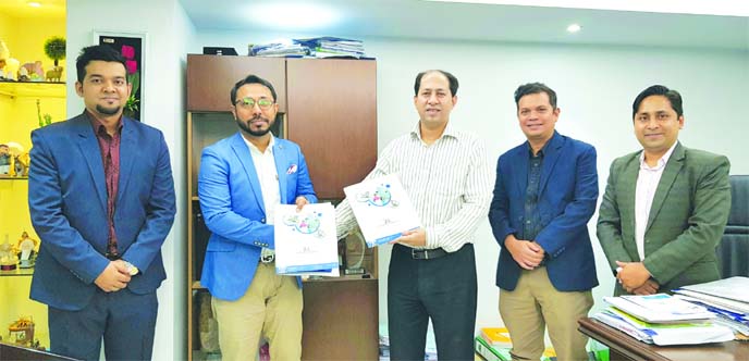 Ashis Kumar Chakraborty, Managing Director of Universal Medical College Hospital (UMCH) and Shuvasish Bhowmick, Country Director of ATEC Australia International Limited, exchanging a health agreement signing document at UMCH head office in the city on Mon