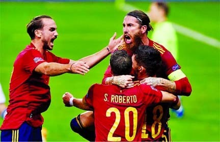 Players of Spain celebrate the goal during the UEFA Nations League group match between Spain and Germany in Estadio La Cartuja in Seville, Spain on Tuesday.