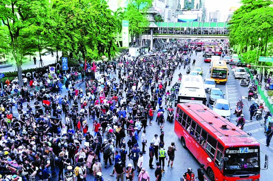 Demonstrators gather at Ratchaprasong intersection in Bangkok shortly before 4pm on Wednesday to join an anti-government rally.