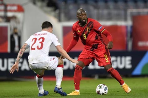 Belgium's forward Romelu Lukaku (right) fights for the ball with Denmark's midfielder Pierre Hojbjerg during UEFA Nations League football match between Belgium and Denmark at the Den Dreef Stadium in Leuven on Wednesday.