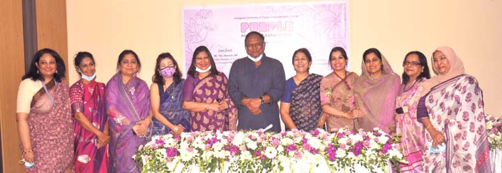 Commerce Minister Tipu Munshi poses for a photo session after inauguration the operation of Purple Food and Agro Limited, the first cent percent women ownership food and agro based product business in the country at its head office in the city on Thursday
