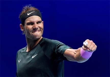 Spain's Rafael Nadal celebrates after winning his group stage match against Greece's Stefanos Tsitsipas at the ATP World Tour Finals 2020 in London, Britain on Thursday.