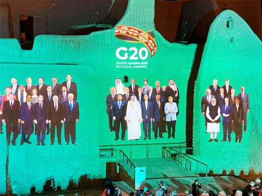 "Family Photo" for annual G20 Summit World Leaders is projected onto Salwa Palace in At-Turaif, one of Saudi Arabiaâ€™s UNESCO World Heritage sites, in Diriyah, Saudi Arabia.