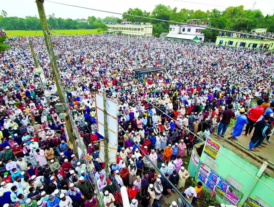 Muslims attend the namaz-e-janaza (funeral prayers) of Golam Sarwar Sayeedi in Brahmanbaria on Saturday.