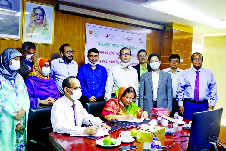 Hosne Ara Begum ndc, Managing Director (Secretary) of Bangladesh Hi-Tech Park Authority and Mr. Pranesh Ranjan Sutradhar, Chief Controller of Imports & Exports sign a Memorandum of Understanding on behalf of their respective organizations in the capital o