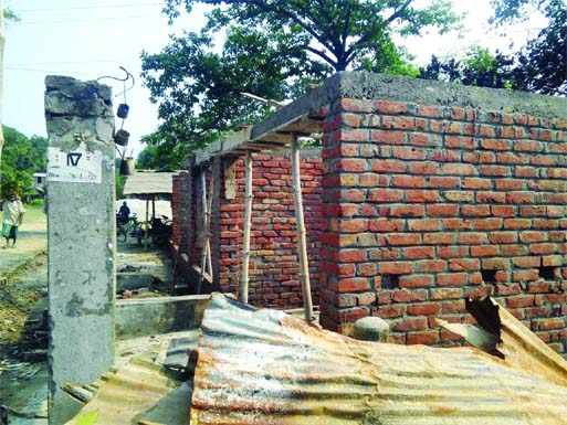 An influential quarter constructs a house illegally grabbing a piece of government land in Kotchandpur upazila in Jhenaidah district.