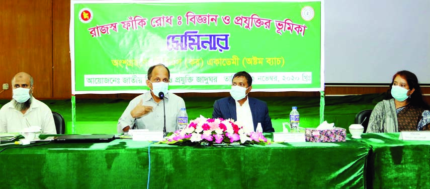 Director General of National Museum of Science and Technology Munir Chowdhury speaks at a seminar on 'Preventing Tax Evasion by Digital Innovation' at the conference room of the museum in the city on Sunday.