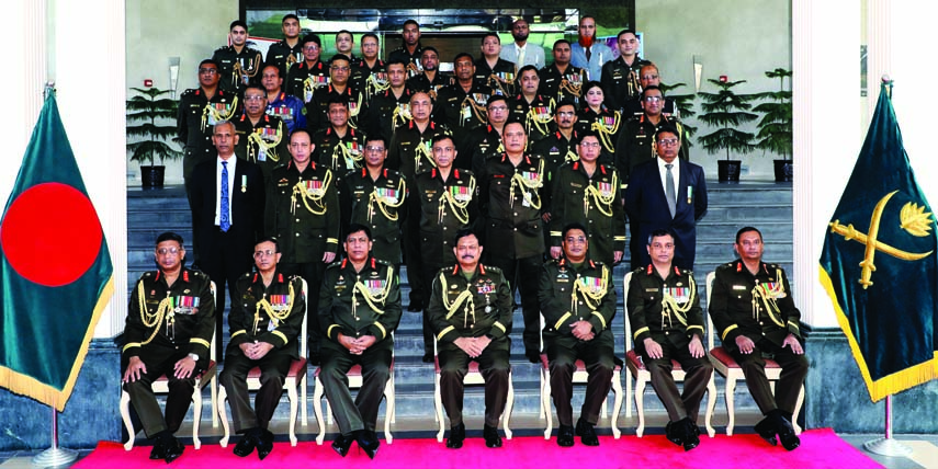 Chief of Army Staff General Aziz Ahmed at a photo session with the recipients of' 'Shantikalin Padak' in Helmet Auditorium of the Army Headquarters on Monday marking Armed Forces Day. ISPR photo