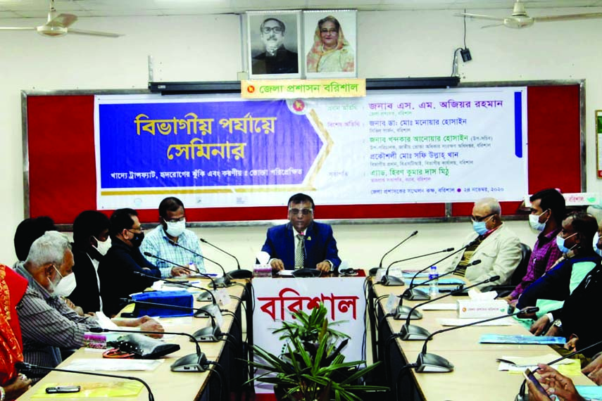 Barishal DC SM Ajior Rahman speaks at a seminar on 'Trans fats in foods, risk of heart disease and necessity: Consumers' Perspective' in the DC's Conference room on Tuesday.