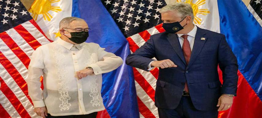 China condemned comments by O'Brien, seen in Manila with Philippines Secretary of Foreign Affairs Teodoro Locsin Jr, left, offering US support over the South China Sea.