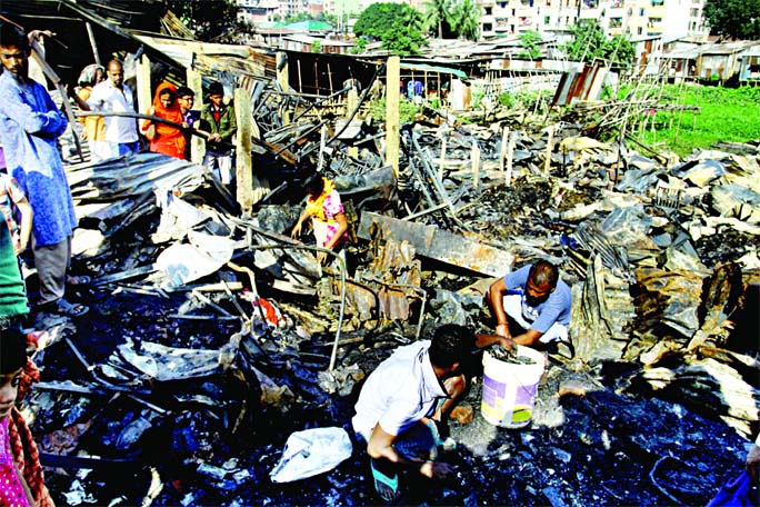 A view of the fire devastated Bawniabadh C Block slum near the Mirpur Kalshi bus stand. The photo was taken on Wednesday.