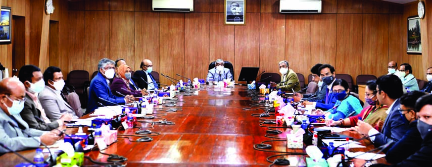 Cabinet Secretary Khondkar Anwarul Islam presides over a meeting at the conference room of the cabinet on Saturday with a view to creating foreign investment-friendly environment in Bangladesh.