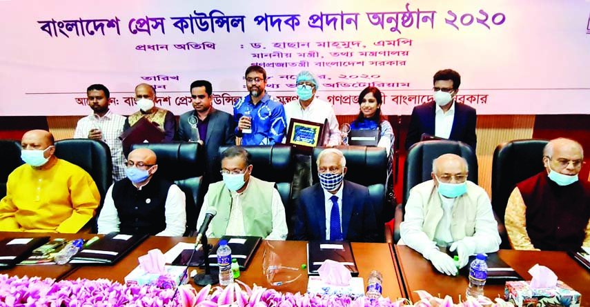 Information Minister Dr. Hasan Mahmud along with the recipients of 'Bangladesh Press Council Padak' at a ceremony organised in the auditorium of Press Institute Bangladesh in the city on Saturday.