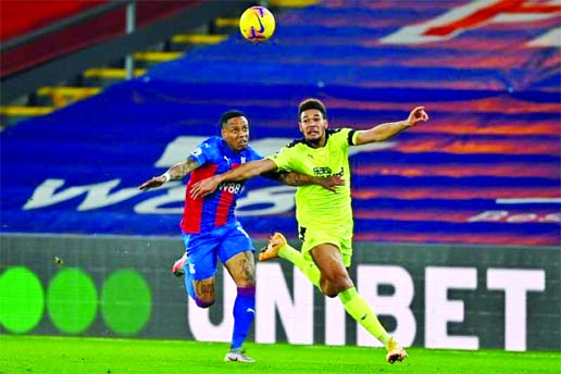 Crystal Palace's English defender Nathaniel Clyne (left) vies with Newcastle United's Brazilian striker Joelinton (right) during the English Premier League football match between Crystal Palace and Newcastle United at Selhurst Park in south London on Fr