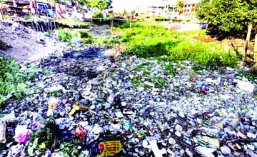 The Nandipara canal in the capital gets totally clogged due to mindless dumping of household and industrial wastes. This photo was taken on Tuesday.