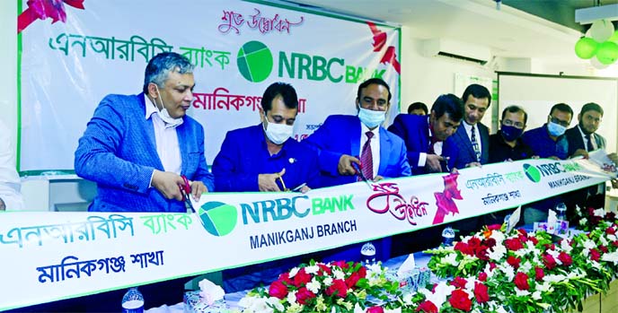 S M Ferdous, DC of Manikganj, inaugurating the 78th branch of NRB Commercial Bank Limited at Shahid Rafik Sarok in Manikganj Sadar on Wednesday as chief guest. AKM Mostafizur Rahman, Director and senior executives of the bank and local elites were also pr