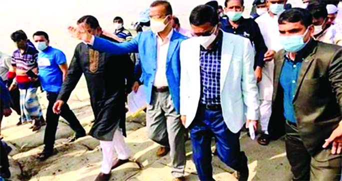 Water Resources Deputy Minister Enamul Huque Shamim visits the Town Protection Dam of Meghna river bank at Puranbazar Horishava area in Chandpur town recently.