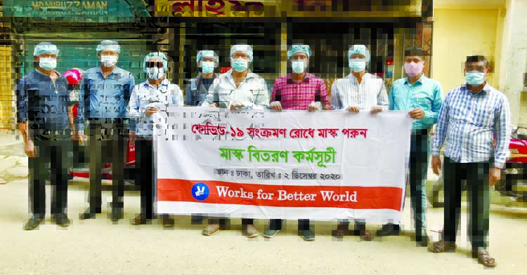 President of 'Works for Better World', a voluntary organization, Sohel Atol, among others, at the masks distribution ceremony in the city on Wednesday with a view to creating awareness among the people about the infection of Covid-19 virus which claime