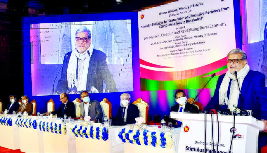 Planning Minister MA Mannan addresses a dialogue on 'Stimulus Packages for Sustainable and Inclusive Recovery from Covid-19 Fallout in Bangladesh' in Osmani Memorial Auditorium in the city on Thursday.