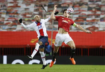 Manchester United's Harry Maguire (right) in action with Paris Saint Germain's Neymar (left) during the Champions League, Group H match at Old Trafford, Manchester, Britain on Wednesday.