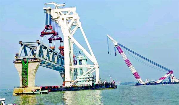 The near end under-construction Padma Bridge from the Mawa point marks the achievement of the present government which did not bend down to the unjust pressure soon the bridge will be completed.