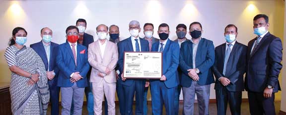 Khwaja Shahriar, Managing Director & CEO of LankaBangla Finance Limited (LBFL), poses for a photo session with the senior executives of the company after recovering the ISOIEC 27001:2013 Certification by the British Standards Institute (BSI), an Internat